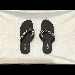 Guess size 7 black and white flip flops